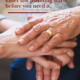 older gentleman's hand with wedding ring holding someone's hand in comfort
