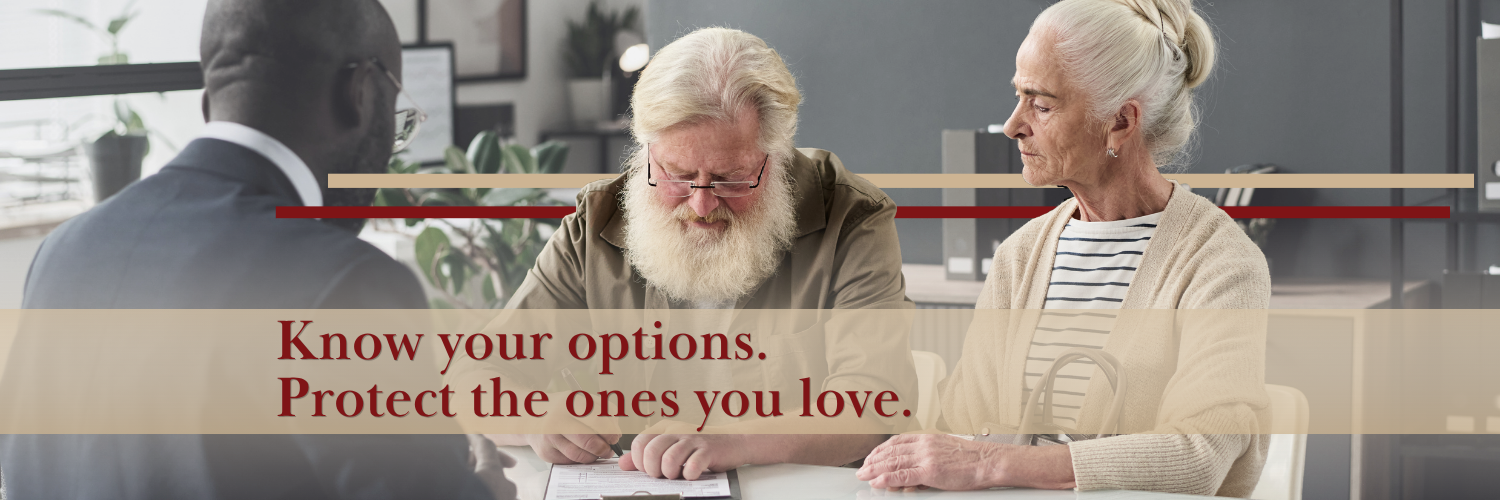 older couple signing an agreement with an attorney present
